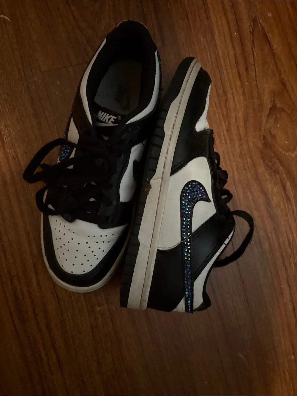 Nike Black and White Low-Top Sneakers with Iridescent Swoosh
